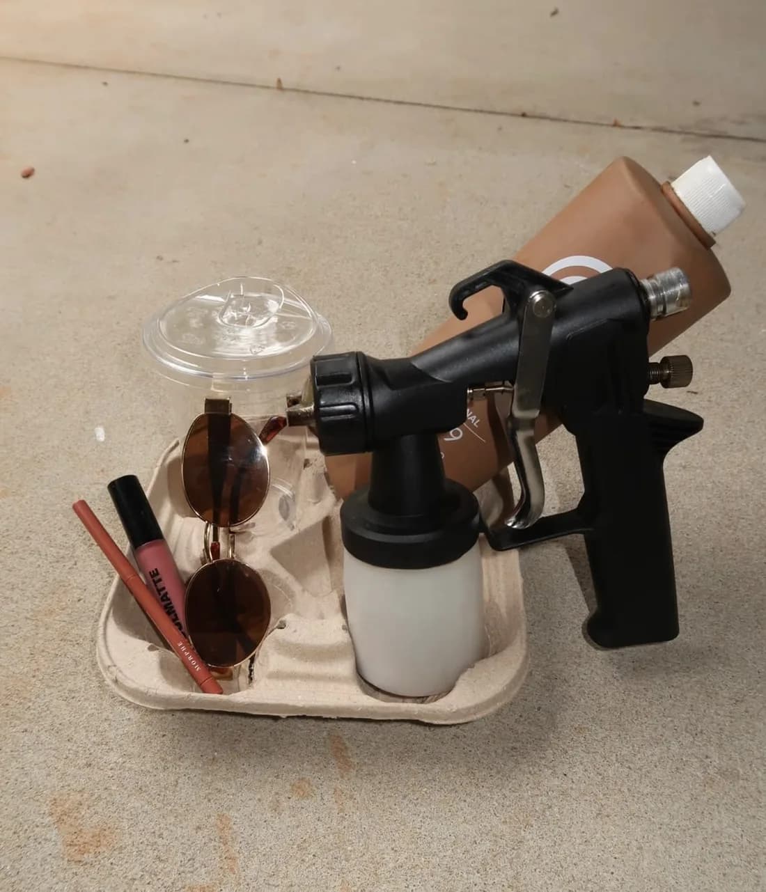 A portable Glowtoure spray tan kit packed and ready for a mobile appointment